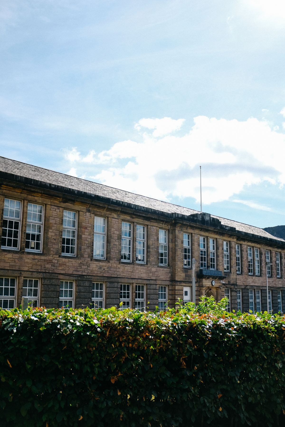 Stone-built UK school building in daylight